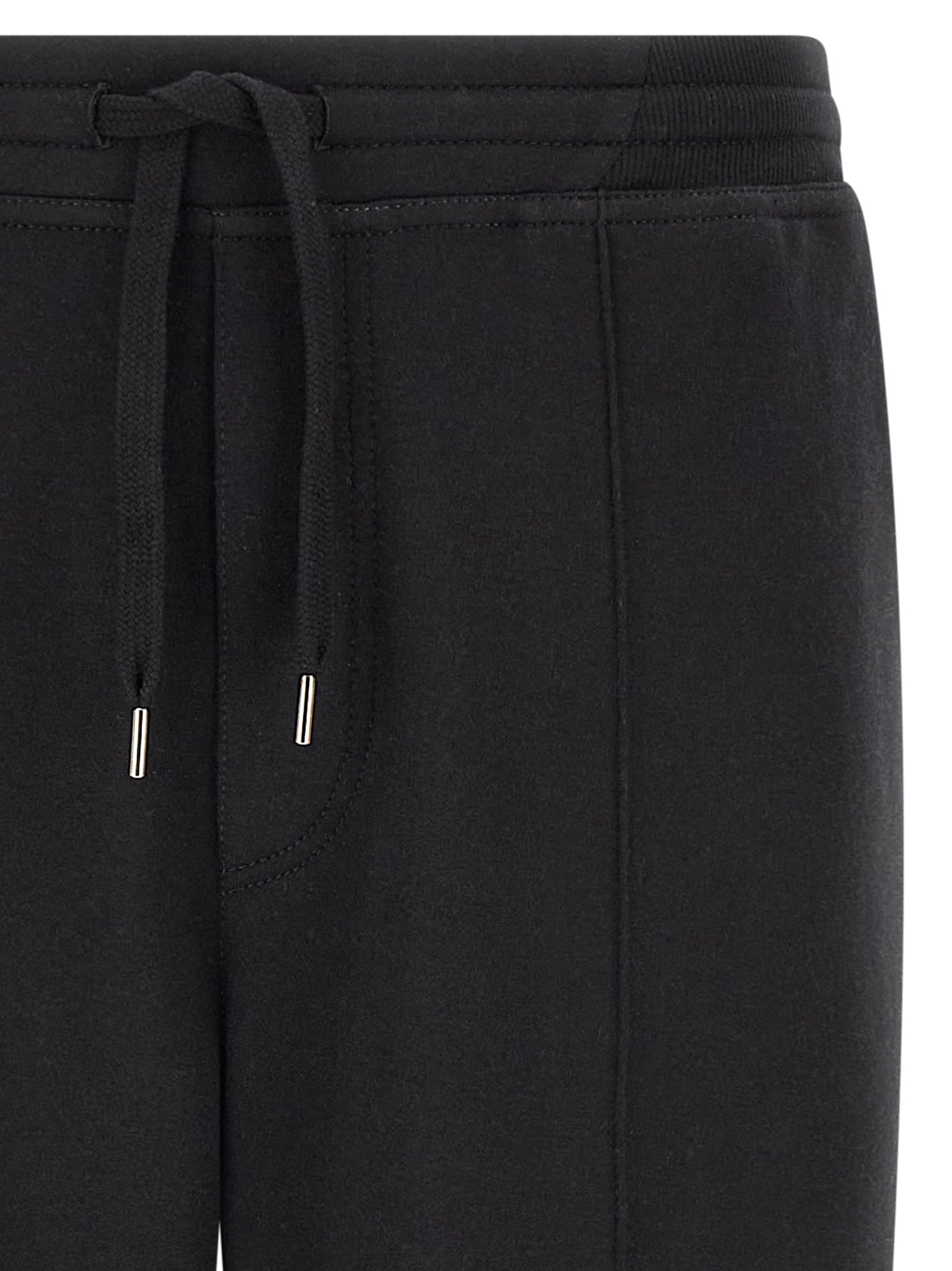 Joggers by Brunello Cucinelli for men in cashmere & silk black & silver features a refined silhouette with a refined tapered-leg, defined by a and a refined long for a refined finish.