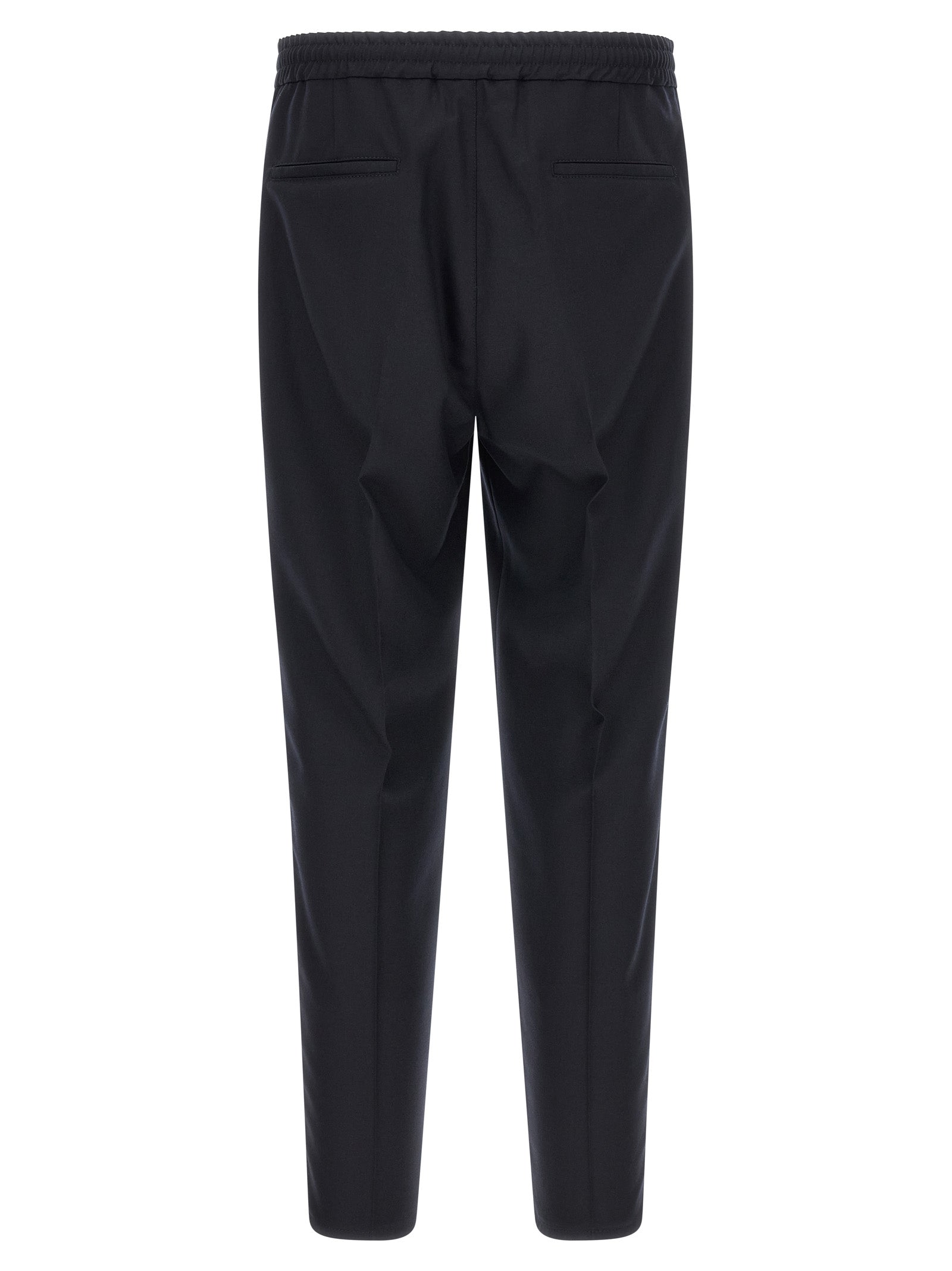 Trousers by Brunello Cucinelli for men in virgin wool & flannel navy features an on trend silhouette, showcasing a sophisticated tapered-leg & relaxed-fit with a long and for an on trend finish.