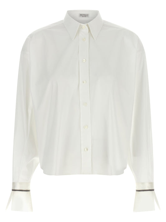 Blouse by Brunello Cucinelli for women in cotton white showcases a sleek silhouette, elegantly detailed with a sleek and for a sleek finish.