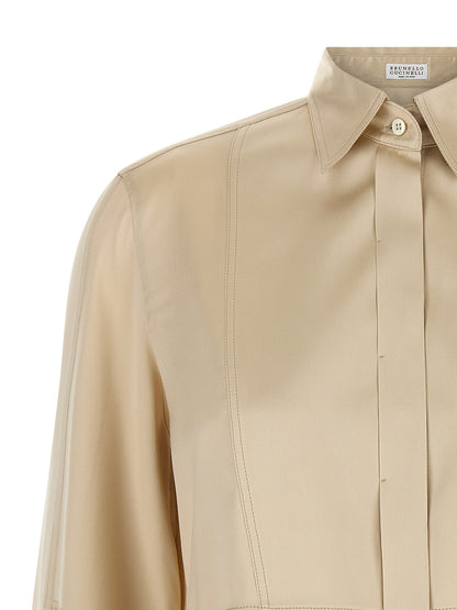 Blouse by Brunello Cucinelli for women in silk satin beige & sand presents a discerning silhouette, showcasing a sophisticated and for a truly discerning finish.