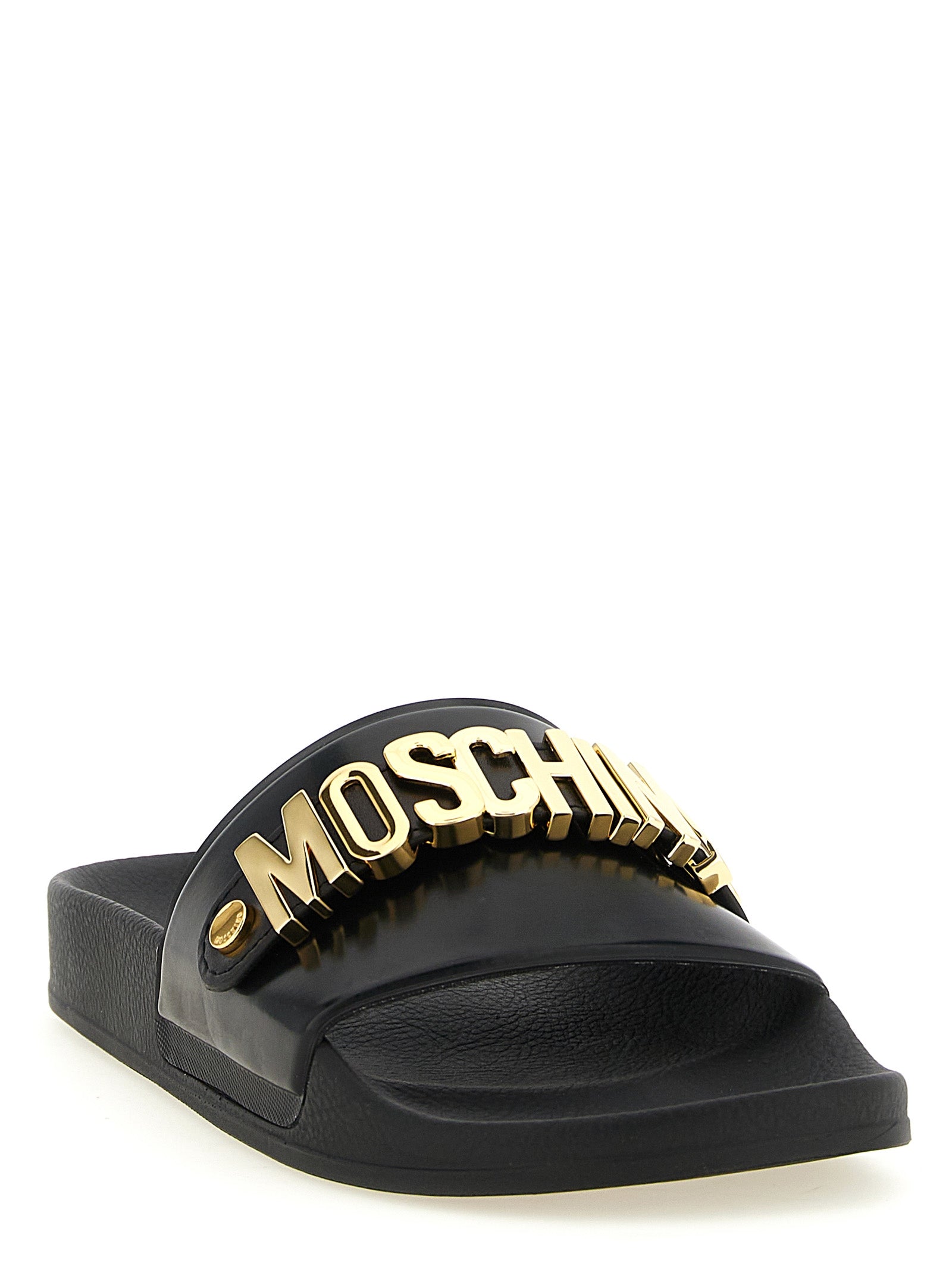 Sliders Sandals Flat Shoes by Moschino for men in pvc gold features an captivating silhouette, showcasing the captivating style of the Men's PVC Sliders Sandals Flat Shoes with its distinct and refined .