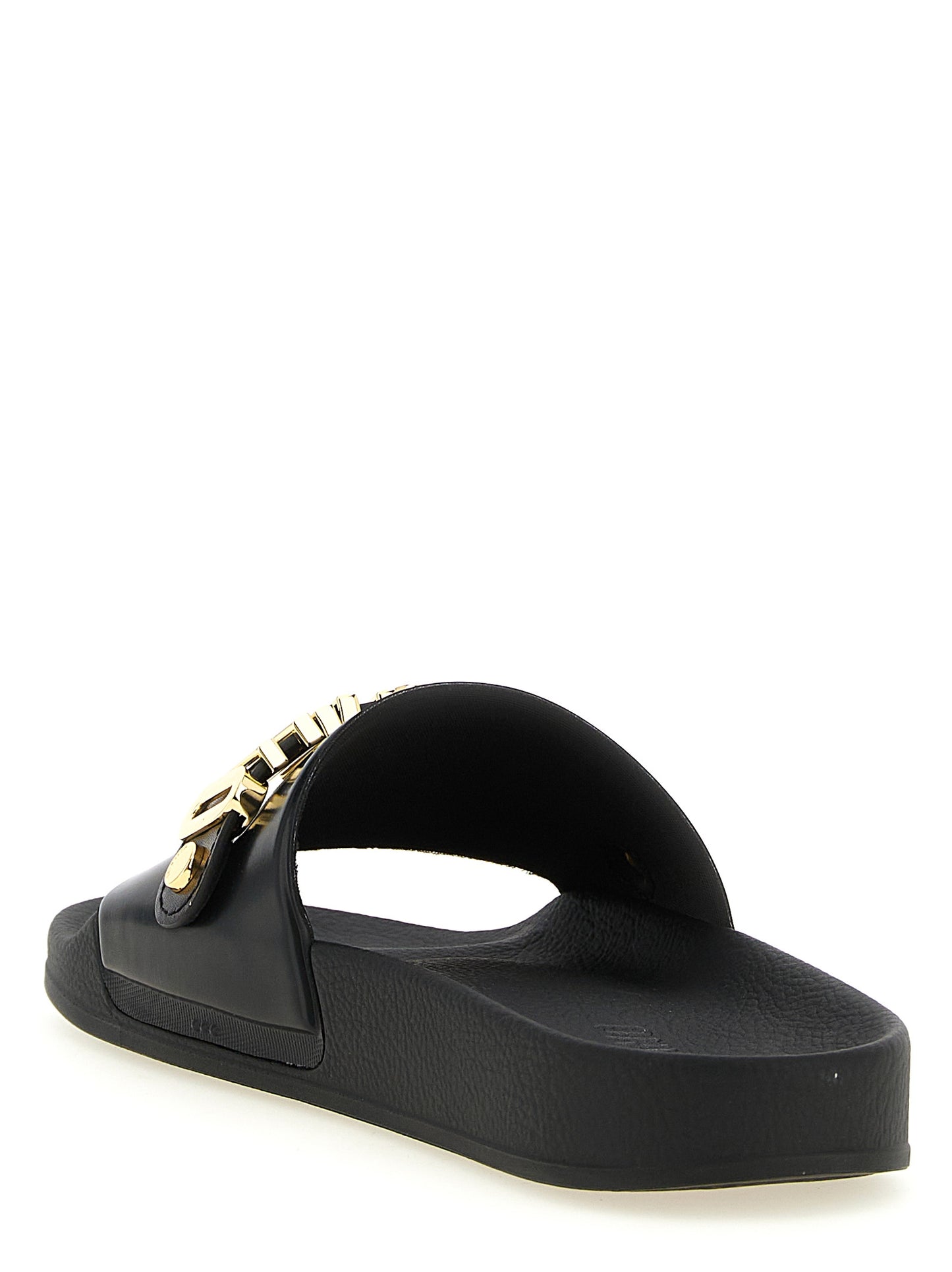 Sliders Sandals Flat Shoes by Moschino for men in pvc gold showcases a enchanting silhouette as part of the Men's PVC Sliders Sandals Flat Shoes collection, defined by a enchanting and for a enchanting look.