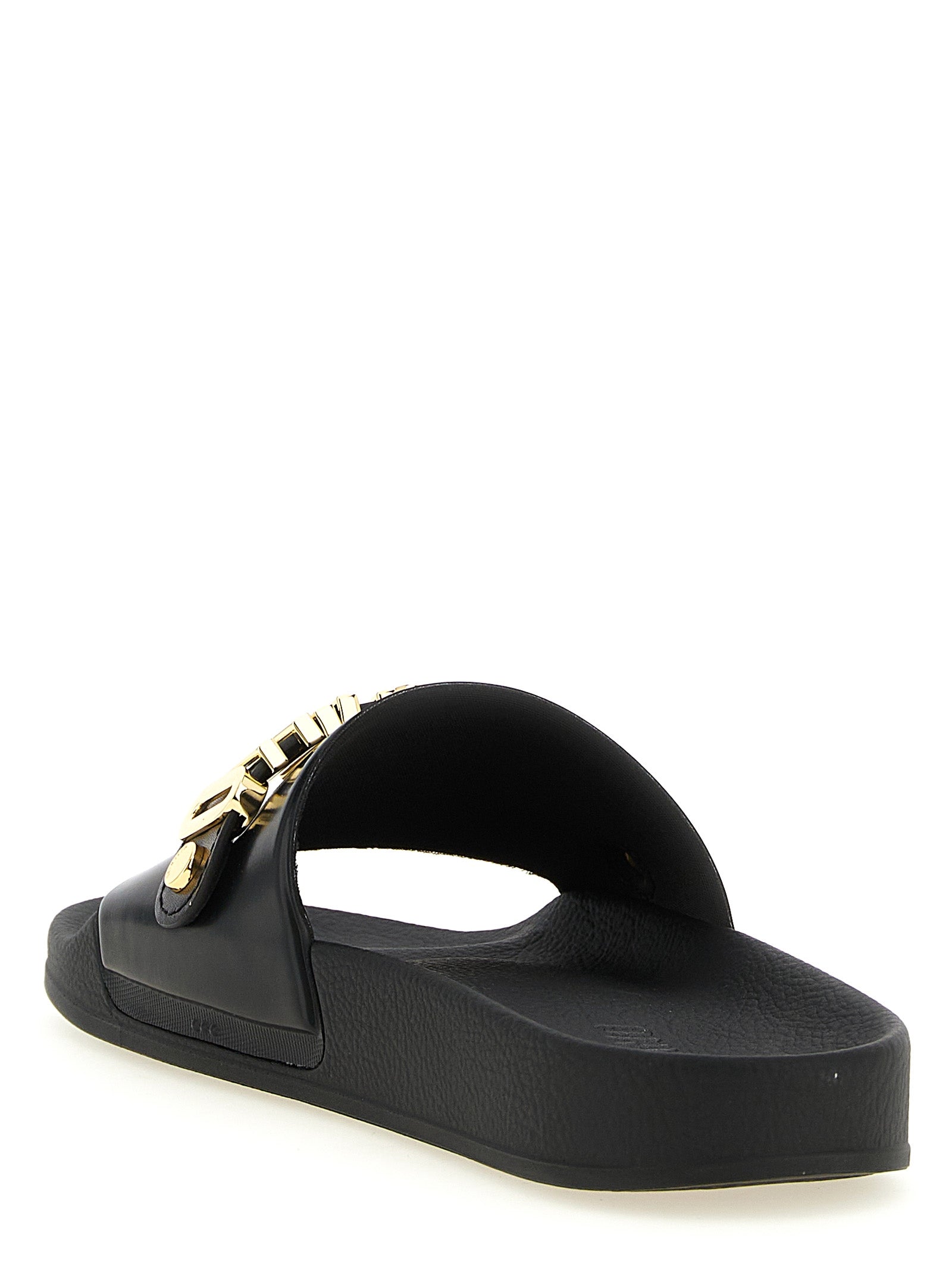 Sliders Sandals Flat Shoes by Moschino for men in pvc gold showcases a enchanting silhouette as part of the Men's PVC Sliders Sandals Flat Shoes collection, defined by a enchanting and for a enchanting look.