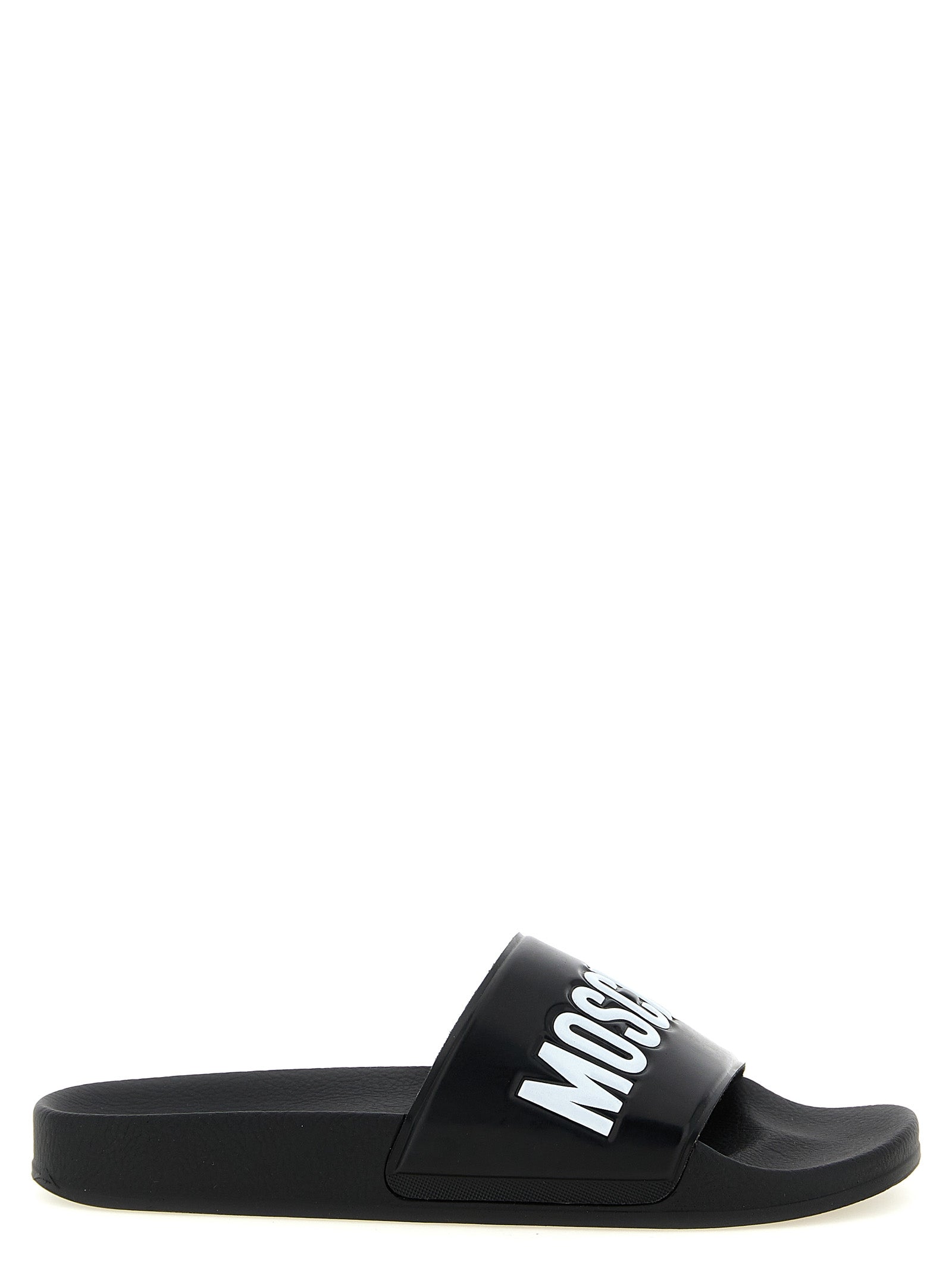 Flat Shoes by Moschino for men in pvc bicolour showcases a resplendent Men's PVC Flat Shoes aesthetic, defined by its resplendent and elegant flat.