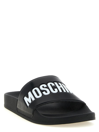 Flat Shoes by Moschino for men in pvc bicolour showcases a impeccable silhouette as Men's PVC Flat Shoes, artfully designed with a impeccable flat and refined for a impeccable finish.