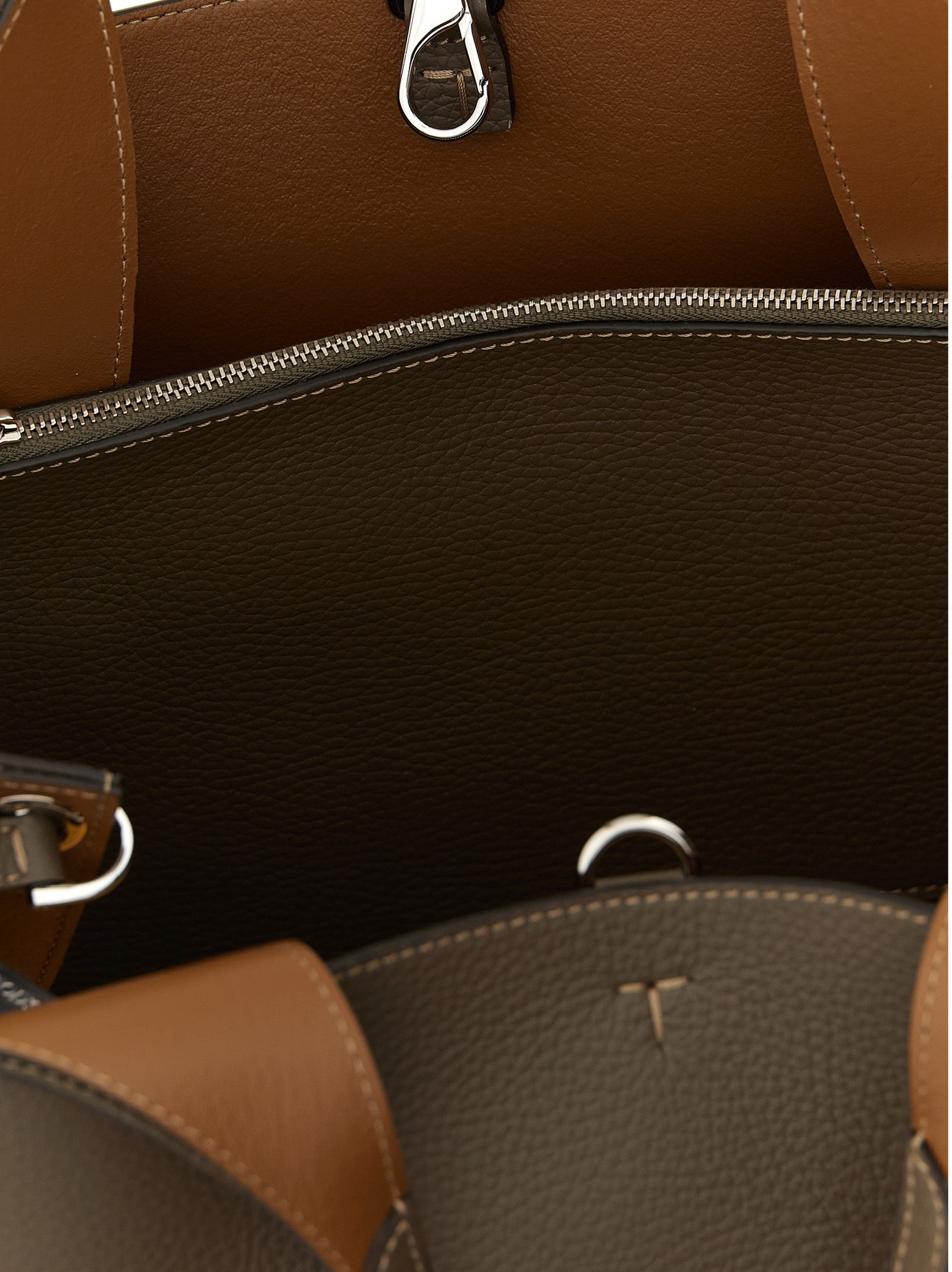 Small Bucket Handbag by Tod's for women in calfskin leather brown, gray & silver presents a ornamental silhouette, showcasing a secure buckle, ample , and versatile shoulder-strap, handle, adjustable-strap & detachable-strap for a ornamental finish.