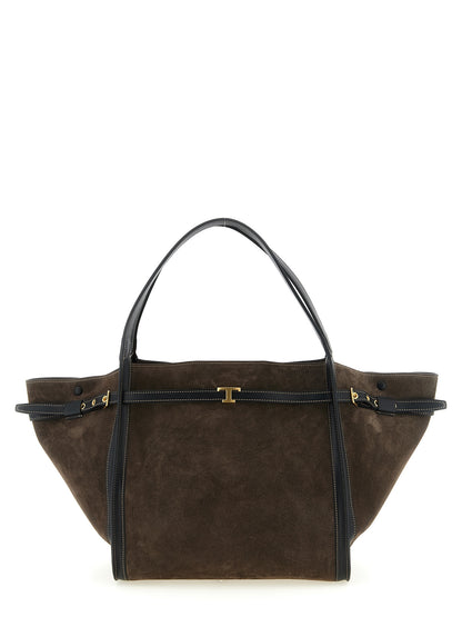 Shopper Tote Bag by Tod's for women in calfskin leather & nylon brown & gold features a jet-set sophisticated T Timeless Tim Calfskin Leather & Nylon Shopper Tote Bag design with a secure snap & zipper, ample , and versatile handle, adjustable-strap & belt-strap for a jet-set sophisticated finish.