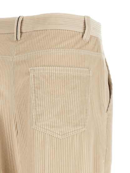 Trousers by Brunello Cucinelli for women in cotton corduroy beige features a tailored silhouette with a tailored wide, defined by its long and a sophisticated high rise.