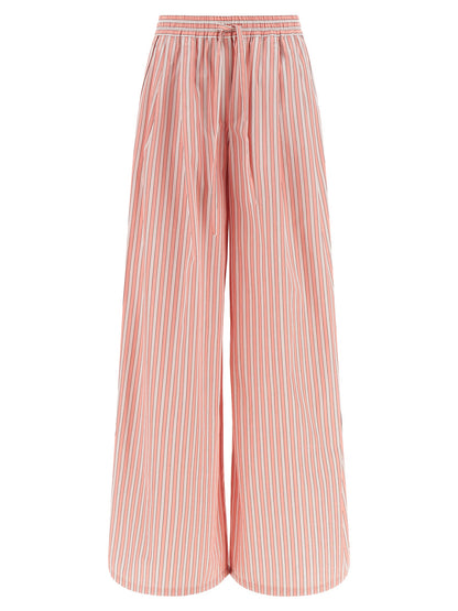 Pajamas by Dolce & Gabbana for women in cotton & silk multicolor, pink & striped features an ethereal silhouette, artfully capturing the ethereal aesthetic of Women's Cotton & Silk Pajamas with a focus on refined comfort.