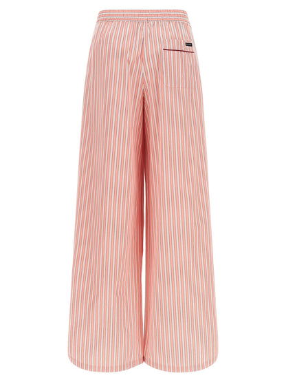 Pajamas by Dolce & Gabbana for women in cotton & silk multicolor, pink & striped features a avant-garde silhouette, artfully capturing the essence of the avant-garde Women's Cotton & Silk Pajamas design for a sophisticated and relaxed look.