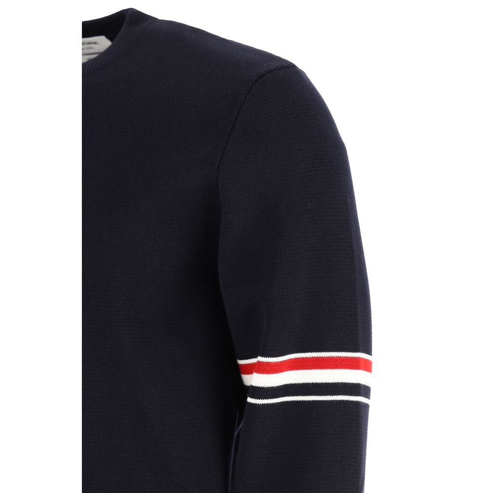 Sweatshirt by Thom Browne for men in cotton blue & striped features an provocated silhouette, detailed with a provocated and a refined for a sophisticated aesthetic.