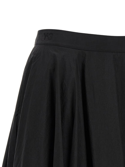 Skirt by Y-3 for women in polyamide gradient, black, signature & striped features an relaxed-yet-refined silhouette that elegantly showcases the Women's Polyamide Mini Skirt design and sophisticated mini.