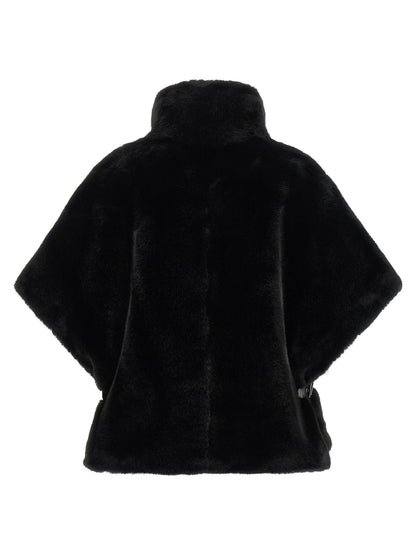 Cape by PINKO for women in polyester leather black & silver showcases a enveloping silhouette, elegantly detailed with a enveloping wrap high-neck neckline and premium .