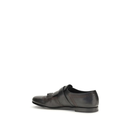 Loafer Slip-On Shoes by Church's for men in bos taurus calf leather & wool black & houndstooth showcases a timeless silhouette from the Men's Bos Taurus Calf Leather & Wool Loafer Slip-On Shoes collection, featuring a timeless and for a timeless finish.