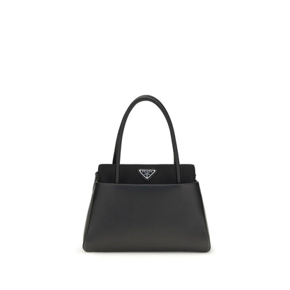 Compact Handbag by Prada for women in bos taurus calfskin leather black & signature features a contemporary silhouette, showcasing a secure , ample , and contemporary shoulder-strap, handle & detachable-strap for a sophisticated look.
