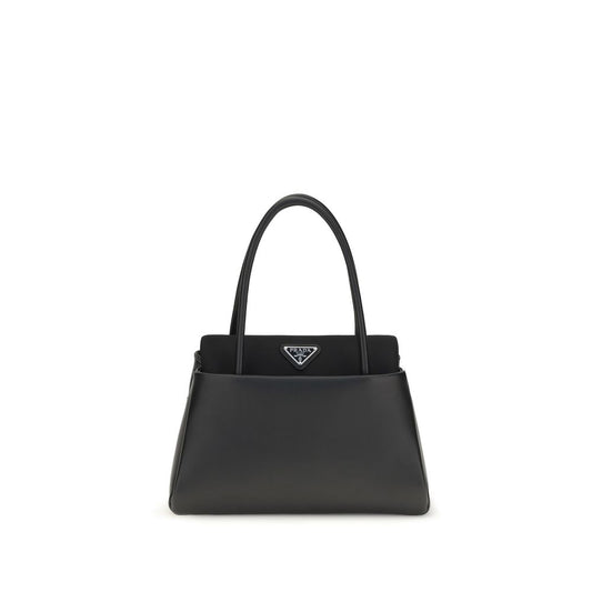 Compact Handbag by Prada for women in bos taurus calfskin leather black & signature features a contemporary silhouette, showcasing a secure , ample , and contemporary shoulder-strap, handle & detachable-strap for a sophisticated look.