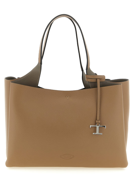 Medium Tote Bag by Tod's for women in calfskin leather brown, camel, silver & signature features an jet-setting Essence T Timeless Calfskin Leather Medium Tote Bag design with a secure hook, jet-setting built-in-compartments, and versatile handle for a jet-setting look.