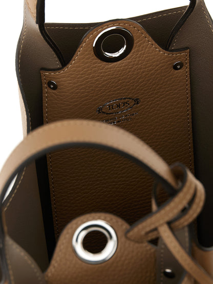 Mini Bucket Handbag by Tod's for women in calfskin leather brown & silver features a signature silhouette, showcasing a secure and signature with versatile shoulder-strap, handle & adjustable-strap for a sophisticated look.