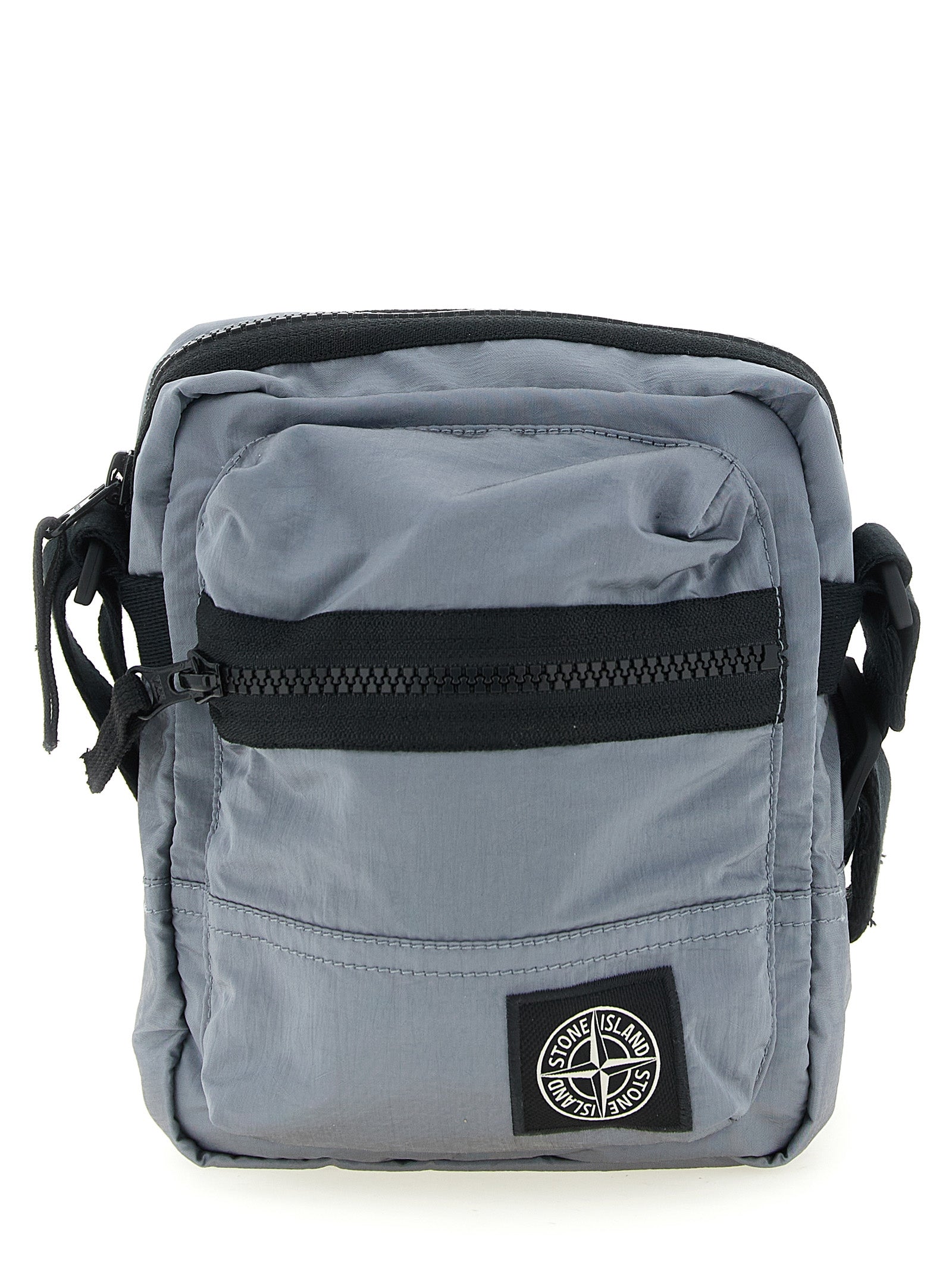 This Crossbody Messenger Bag by Stone Island for men in polyamide leather gray presents a versatile silhouette from the Polyamide Leather Crossbody Messenger Bag collection, featuring a secure , ample , and versatile crossbody-strap & adjustable-strap.