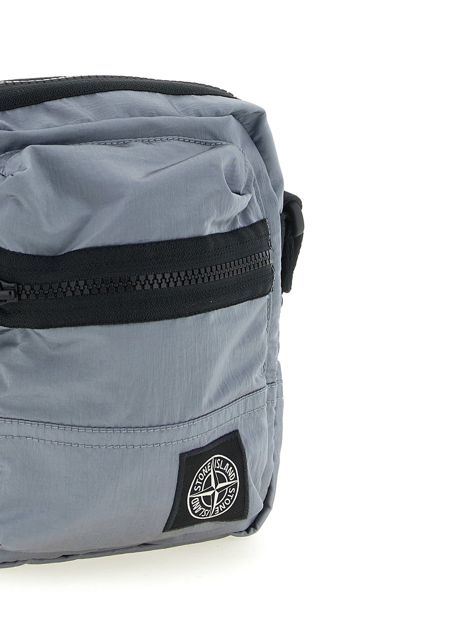 Crossbody Messenger Bag by Stone Island for men in polyamide leather gray features a artisanal Polyamide Leather Crossbody Messenger Bag design with a secure , ample , and versatile crossbody-strap & adjustable-strap for a artisanal look.