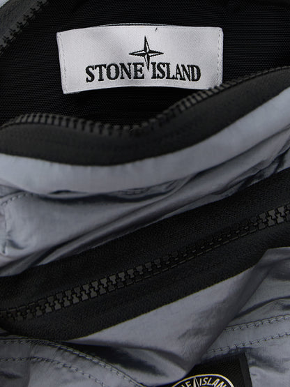 Crossbody Messenger Bag by Stone Island for men in polyamide leather gray features an versatile Polyamide Leather Crossbody Messenger Bag design with a versatile , ample , and versatile crossbody-strap & adjustable-strap for a sophisticated finish.