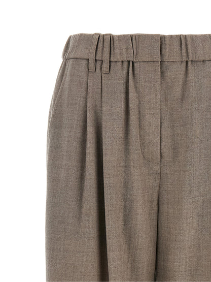 Trousers by Brunello Cucinelli for women in virgin wool white features an sartorial silhouette, showcasing a precise relaxed-fit & wide and long with a sartorial for a refined look.
