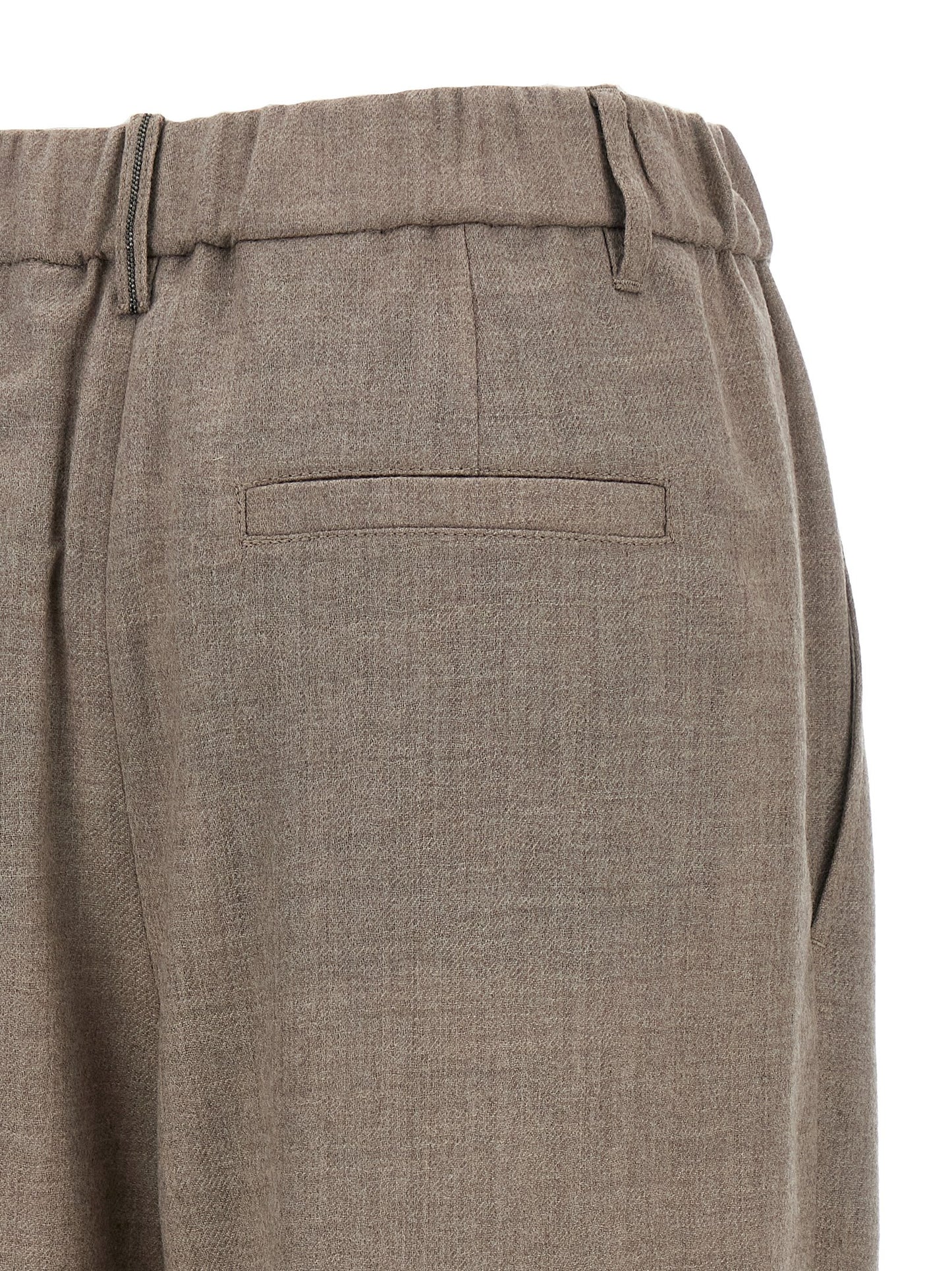 Trousers by Brunello Cucinelli for women in virgin wool white presents a smart silhouette, meticulously detailed with a smart relaxed-fit & wide, a smart long, and a smart .
