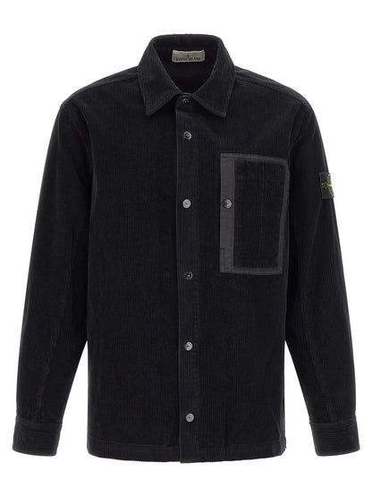 Overshirt by Stone Island for men in cotton corduroy black & signature showcases a sublime silhouette, artfully detailed with a sublime and for a sophisticated, sublime finish.