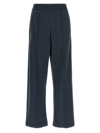 Joggers by Brunello Cucinelli for women in cotton dark-blue features an sophisticated and relaxed-fit & wide with a precise long, creating a sophisticated and sophisticated silhouette.