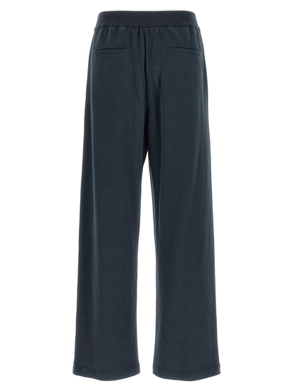 Joggers by Brunello Cucinelli for women in cotton dark-blue features a refined silhouette with a refined relaxed-fit & wide, defined by a and a refined long for a refined finish.
