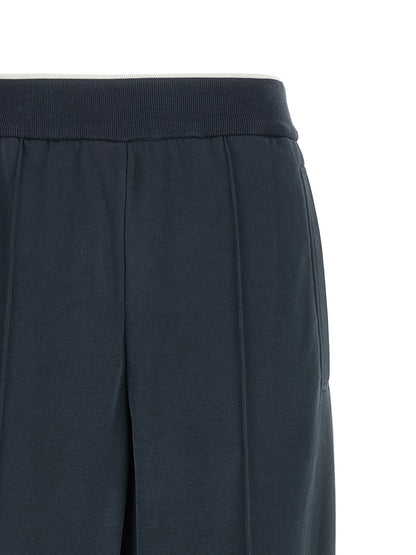 Joggers by Brunello Cucinelli for women in cotton dark-blue features an refined tailoring silhouette, showcasing a premium relaxed-fit & wide with a and long cut for a refined tailoring look.