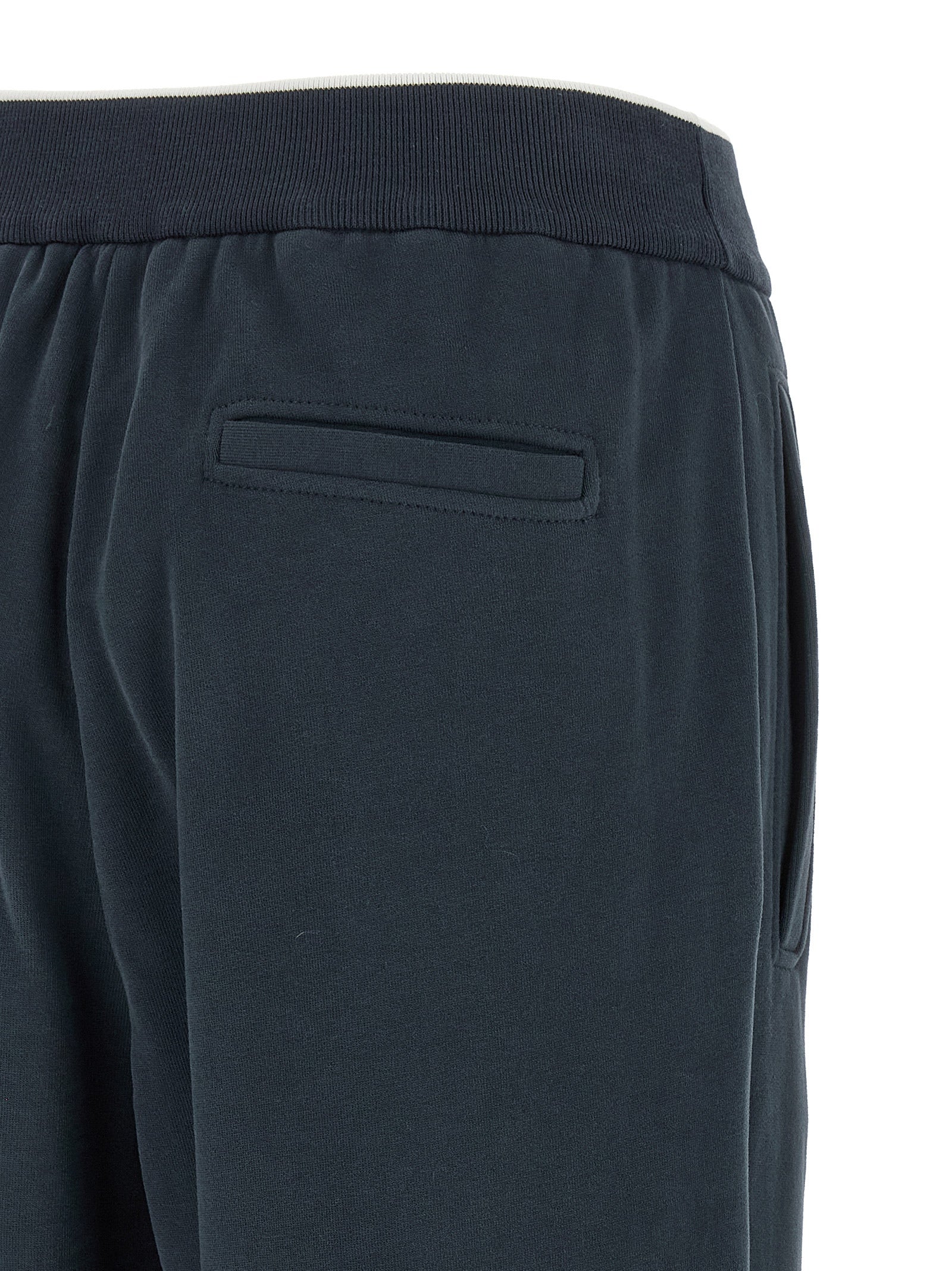 Joggers by Brunello Cucinelli for women in cotton dark-blue presents a refined pantology silhouette, artfully defined by a refined pantology relaxed-fit & wide, long, and a sophisticated .