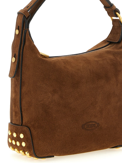 Mini Shoulder Hobo Bag by Tod's for women in calfskin leather brown & signature features a effortless sophistication silhouette, secured by a zipper & clasp with ample and versatile shoulder-strap & adjustable-strap for a effortless sophistication finish.