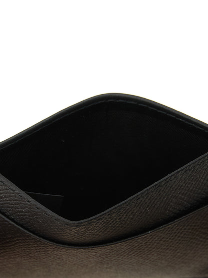Cardholder Card Case by Maison Margiela for men in calfskin leather black & white features a distinguished silhouette, showcasing the distinguished design of the Four Stitches Calfskin Leather Cardholder Card Case with refined card-organization compact-design.