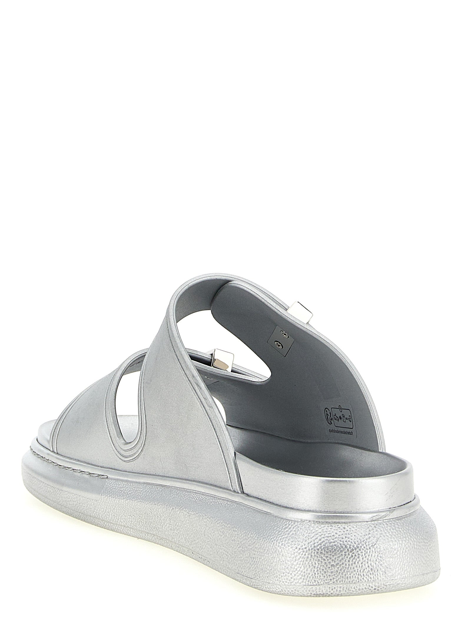 Sliders Sandals Flat Shoes by Alexander McQueen for women in rubber silver showcases a resplendent Women's Rubber Sliders Sandals Flat Shoes aesthetic with a and .