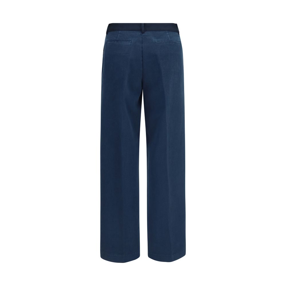 Chinos Pants by Forte_Forte for women in cotton blue features an utilitarian-chic silhouette, showcasing a utilitarian-chic regular-fit & wide with a long cut and low rise for a refined look.