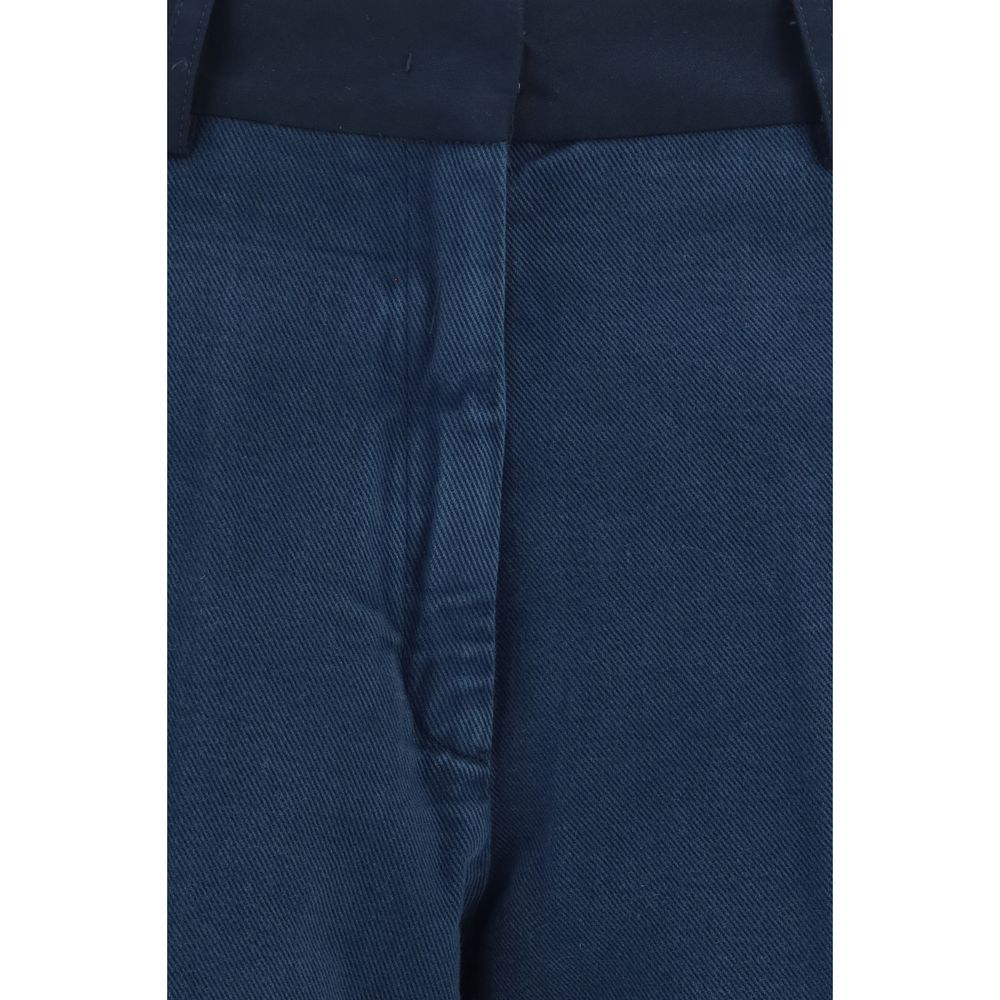 Chinos Pants by Forte_Forte for women in cotton blue presents a sartorial luxe silhouette, showcasing a sophisticated regular-fit & wide with a long and low rise for a premium, sartorial luxe finish.