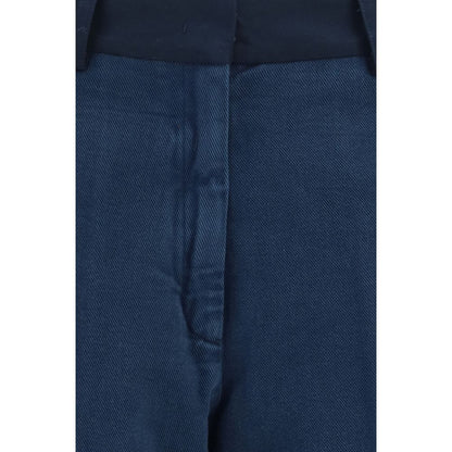 Chinos Pants by Forte_Forte for women in cotton blue presents a sartorial luxe silhouette, showcasing a sophisticated regular-fit & wide with a long and low rise for a premium, sartorial luxe finish.