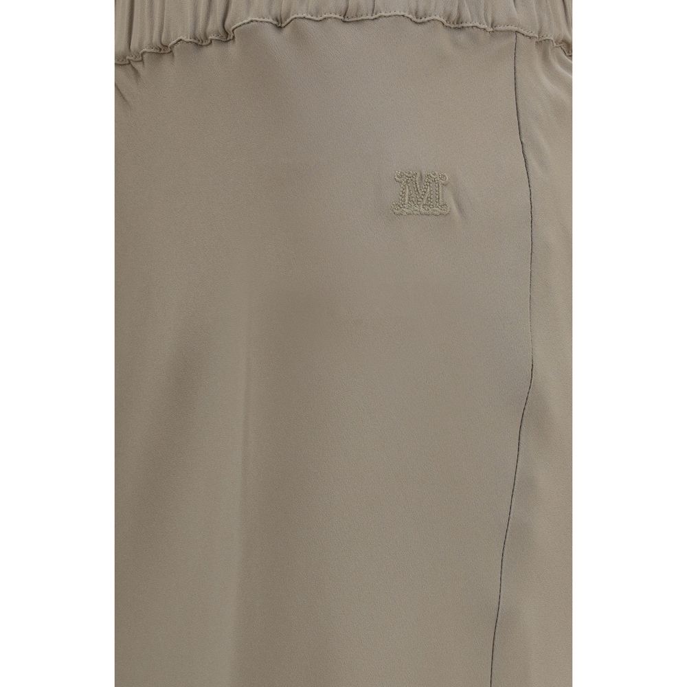 Skirt by Max Mara for women in silk beige & signature features a captivating silhouette, showcasing the captivating Women's Straight Silk Long Skirt design with a sophisticated long for a captivating look.