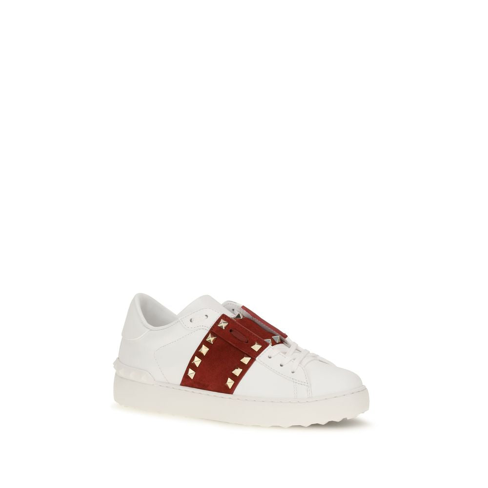 Sneakers by Valentino Garavani for women in bos taurus calf suede leather white & signature features a chic design, perfectly showcasing the chic low-top style of this Rockstud Women's Low Top Bos Taurus Calf Suede Leather Sneakers.