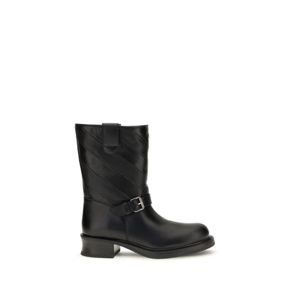 Ankle Strap Boots by Valentino Garavani for women in bos taurus calf nappa leather black & silver showcases a ergonomic silhouette from the Women's Bos Taurus Calf Nappa Leather Ankle Strap Boots collection, featuring a ergonomic and a ergonomic .