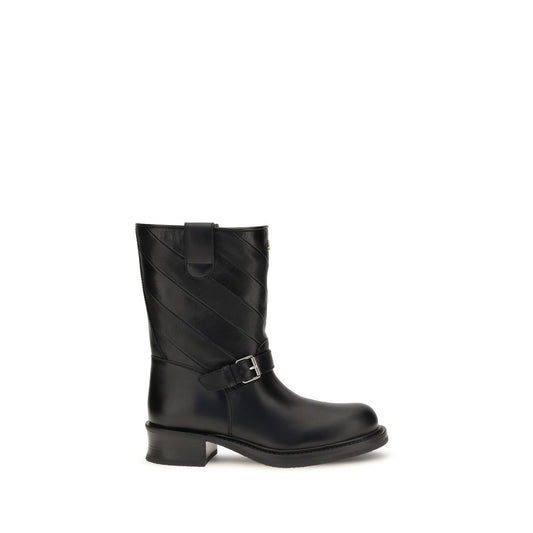 Ankle Strap Boots by Valentino Garavani for women in bos taurus calf nappa leather black & silver showcases a ergonomic silhouette from the Women's Bos Taurus Calf Nappa Leather Ankle Strap Boots collection, featuring a ergonomic and a ergonomic .