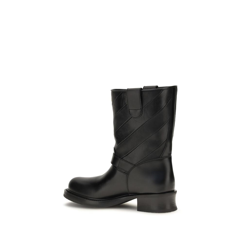 Ankle Strap Boots by Valentino Garavani for women in bos taurus calf nappa leather black & silver showcases a impeccable silhouette as Women's Bos Taurus Calf Nappa Leather Ankle Strap Boots, artfully defined by a impeccable and a impeccable .