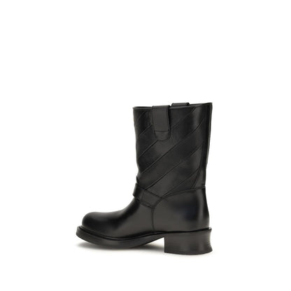 Ankle Strap Boots by Valentino Garavani for women in bos taurus calf nappa leather black & silver showcases a impeccable silhouette as Women's Bos Taurus Calf Nappa Leather Ankle Strap Boots, artfully defined by a impeccable and a impeccable .