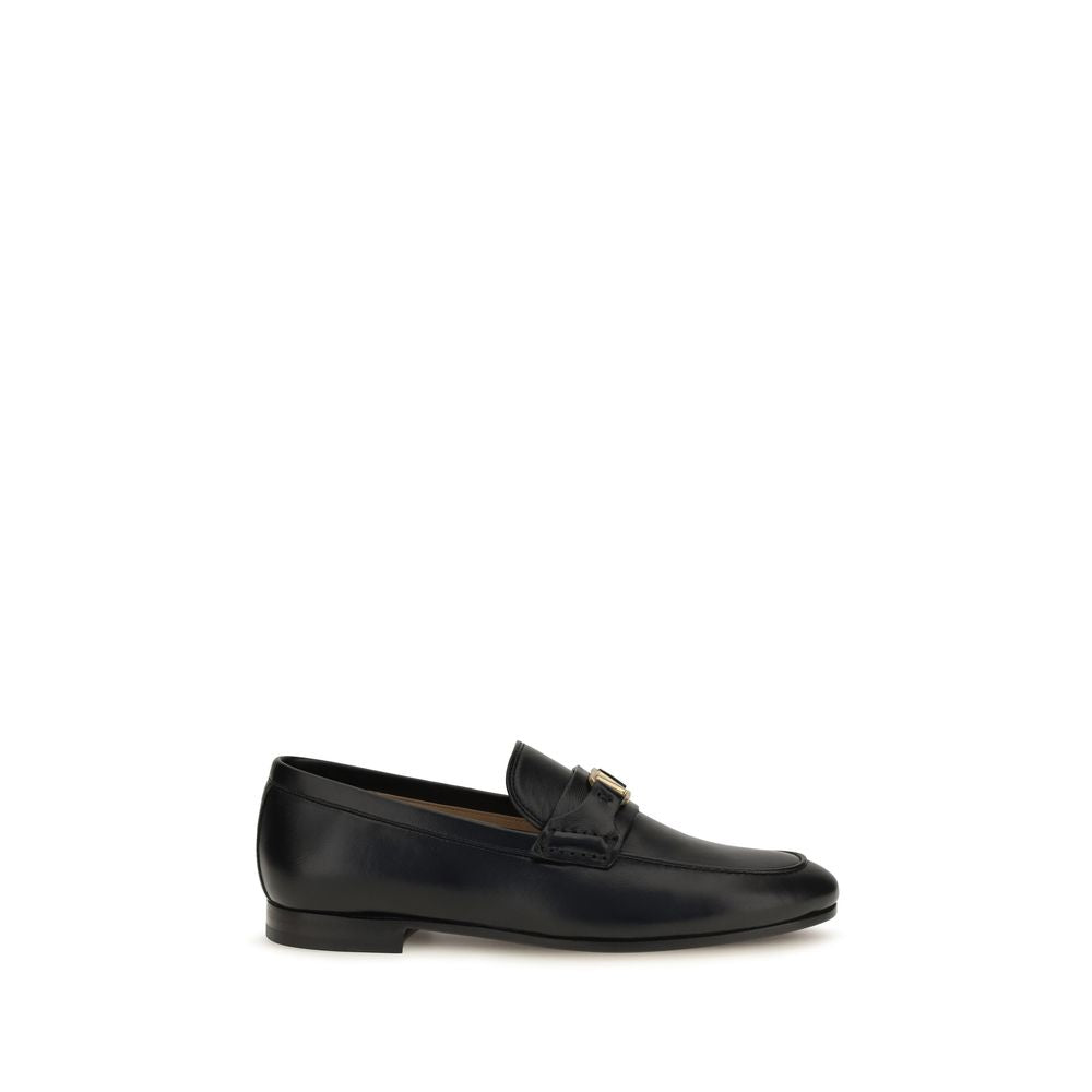 This Flat Loafer Slip-On Strap Shoes by Valentino Garavani for women in bos taurus calf nappa leather black, gold & signature features an exquisite silhouette from the V Logo Women's Bos Taurus Calf Nappa Leather Flat Loafer Slip-On Strap Shoes collection, defined by a sophisticated flat and elegant .