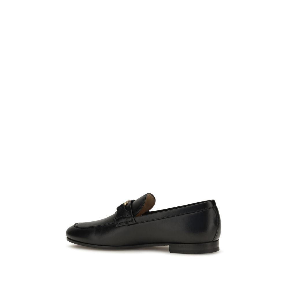 Flat Loafer Slip-On Strap Shoes by Valentino Garavani for women in bos taurus calf nappa leather black, gold & signature features an dynamic silhouette from the V Logo Women's Bos Taurus Calf Nappa Leather Flat Loafer Slip-On Strap Shoes collection, defined by a dynamic and flat for a dynamic look.