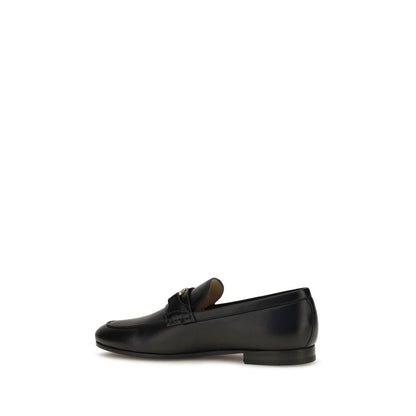 Flat Loafer Slip-On Strap Shoes by Valentino Garavani for women in bos taurus calf nappa leather black, gold & signature features an dynamic silhouette from the V Logo Women's Bos Taurus Calf Nappa Leather Flat Loafer Slip-On Strap Shoes collection, defined by a dynamic and flat for a dynamic look.