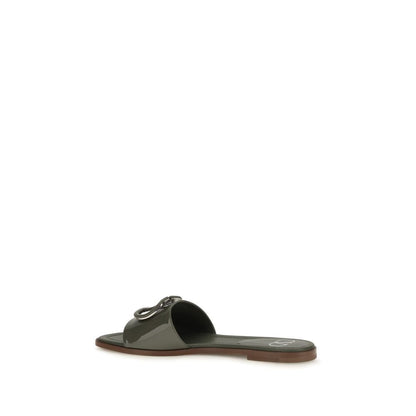 Flat Slider Sandals by Valentino Garavani for women in bos taurus calf patent leather bicolour features an effortlessly chic silhouette from the V Logo Women's Bos Taurus Calf Patent Leather Flat Slider Sandals collection, showcasing a effortlessly chic flat and elegant open toe style.