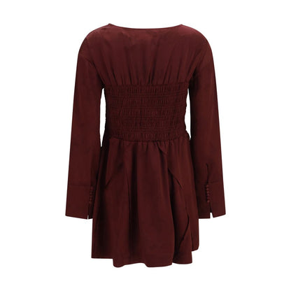 Dress by Ganni for women in polyester satin bordeaux, patterned, floral & print features a dramatic silhouette, showcasing an elegant round neckline and that flows into a dramatic mini.