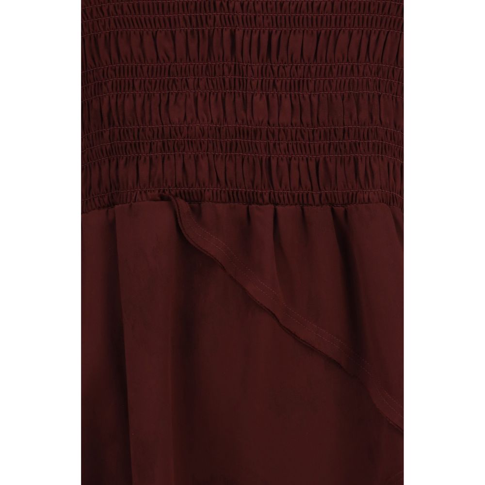 Dress by Ganni for women in polyester satin bordeaux, patterned, floral & print features an magnificent silhouette, artfully detailed with a magnificent and that flows into an magnificent mini.